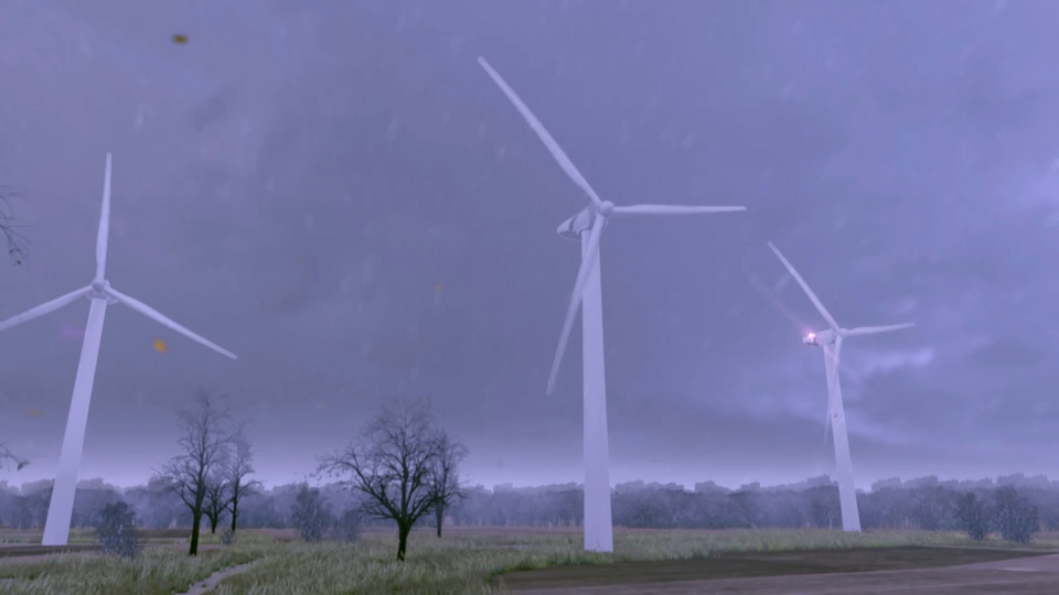Drei Windräder in einer regnerischen Umgebung