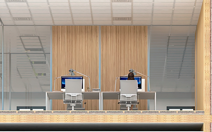 Das Bild zeigt zwei Schreibtische in einem Büroraum.